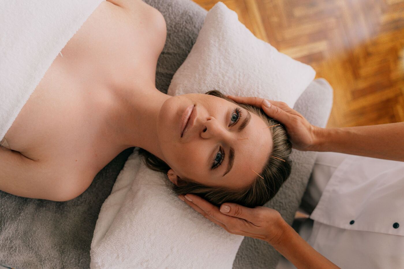 Patient resting during facial acupuncture for Bell's palsy recovery in New Jersey