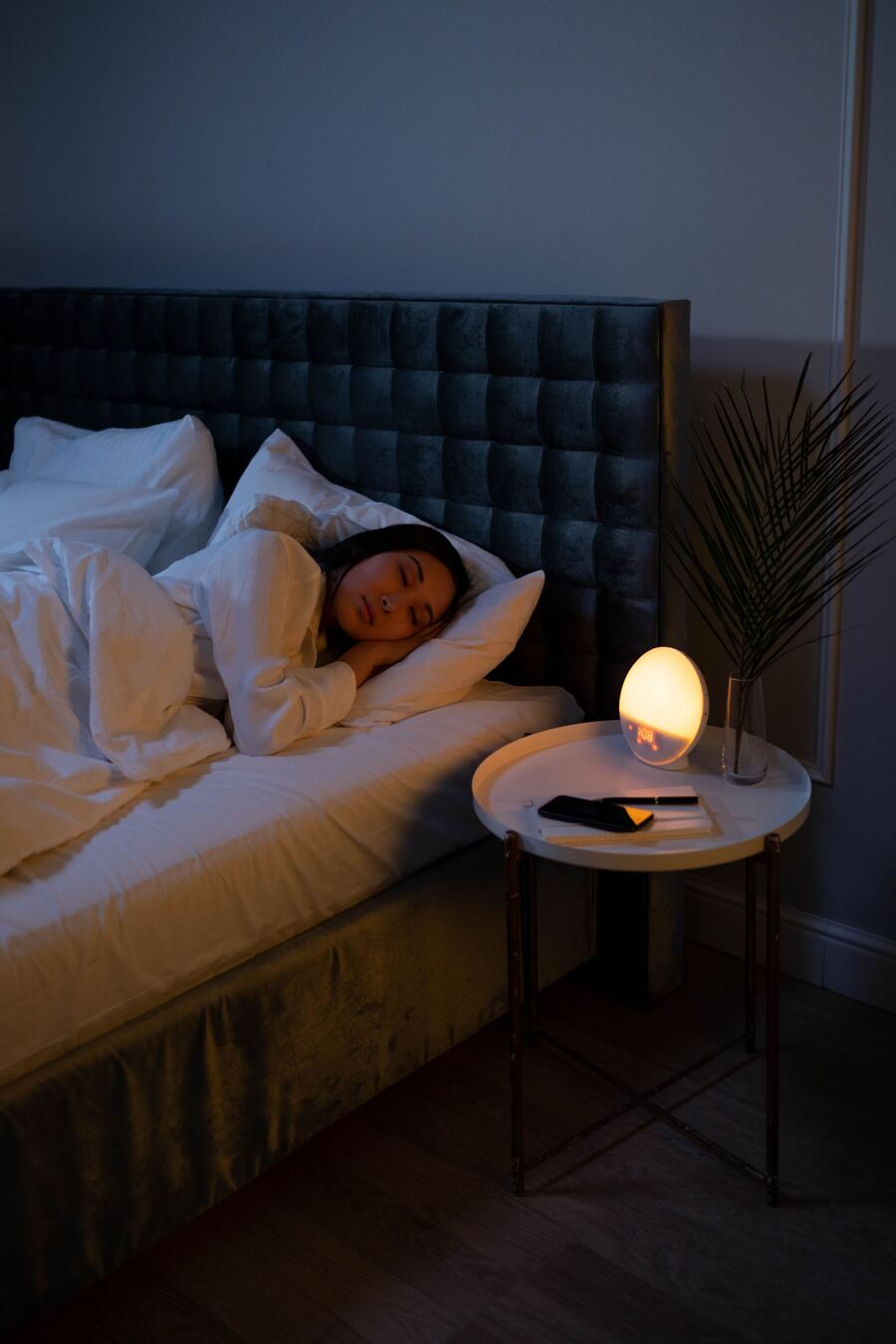 Woman sleeping peacefully after acupuncture for insomnia and anxiety