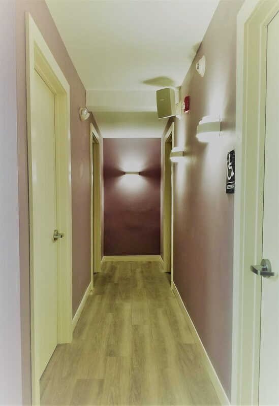 Calm hallway to private treatment rooms inside the Morristown acupuncture clinic